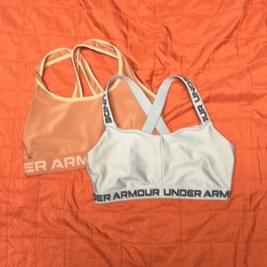 two Under Armour Sport bras